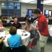 Cleveland Barons Midget Minor serve food at high school faculty luncheon. 