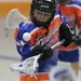 Player waiting to catch a ball with his stick 